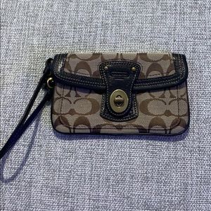 Coach legacy stripe turn lock flap wristlet